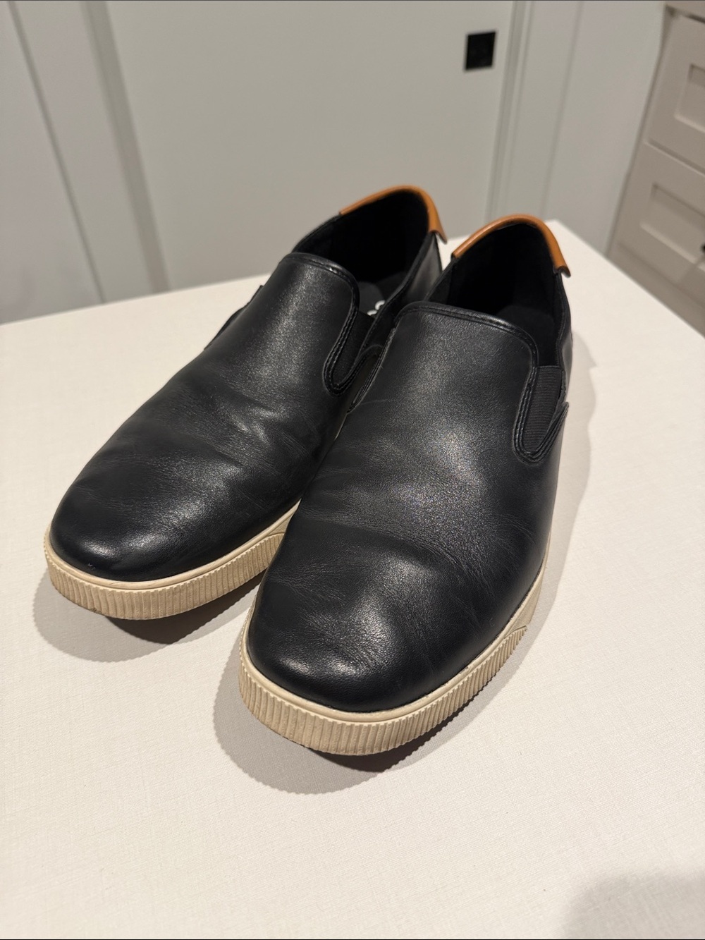 Cole Haan Black Leather Slip-On Loafers with Cream Sole and Tan Heel Tab